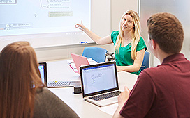 Students discussing their research